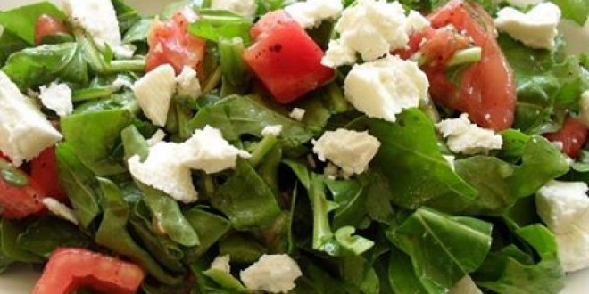 Pomegranate and cheese arugula salad